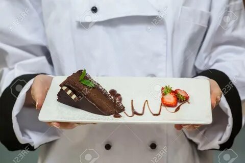 Chef Presenting Chocolate Cake With. 