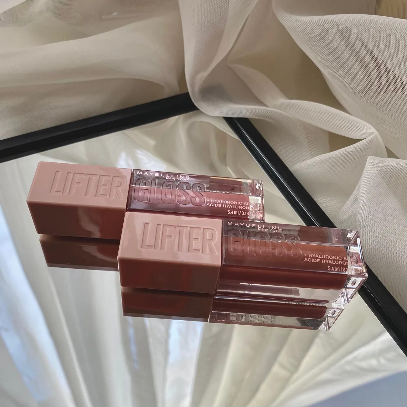 Блеск для губ lifter. Блеск Maybelline Lifter Gloss 009 Topaz. Maybelline блеск 003. Maybelline Lifter Gloss 003. Maybelline Lifter Gloss 004 Silk.