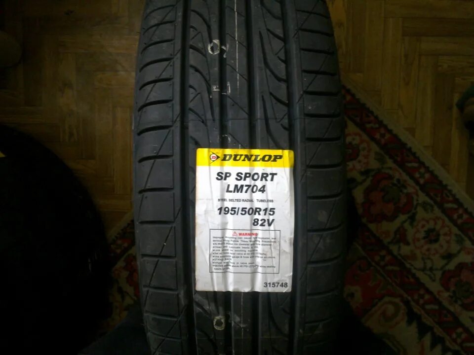 Шины dunlop sp sport lm705w. Dunlop lm704. Dunlop Sport lm704. Dunlop 195/50/15 82v SP Sport lm705w. Dunlop lm705 195/50 r15.