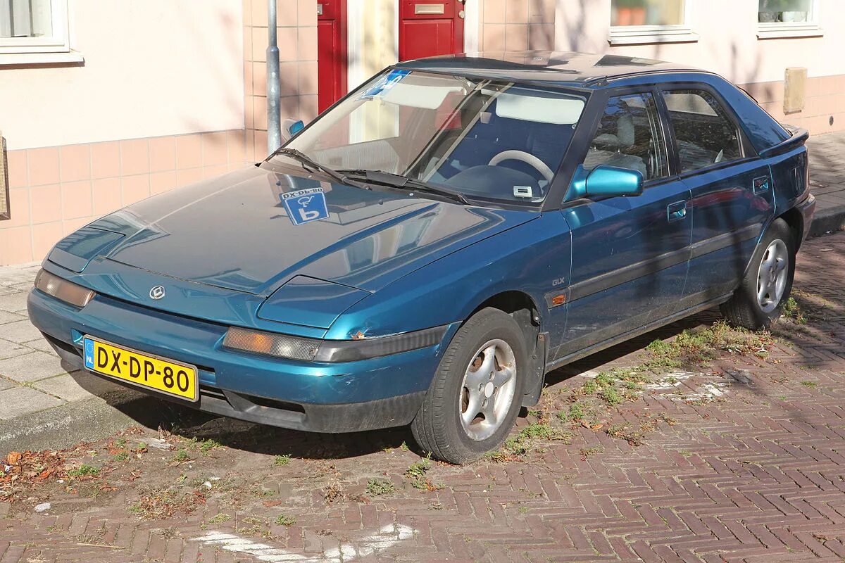 Mazda 1992. Mazda 323f bg синяя. Mazda 323f 1992. Мазда 323 GLX. Мазда 323 f bg.