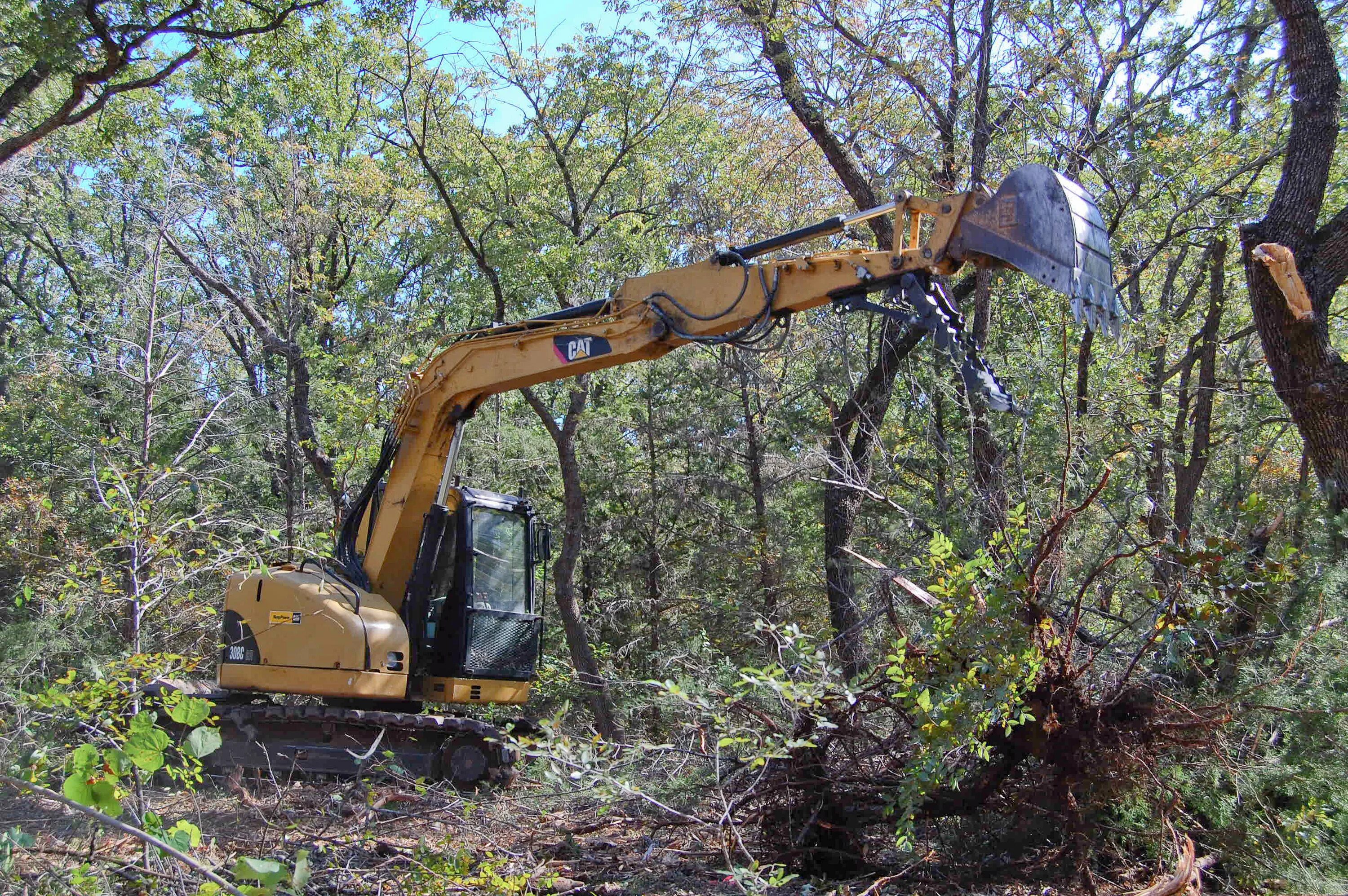 Clearing land. Land clearing. Land clearing and Leveling Machines. Hyd clearing. Clearing.