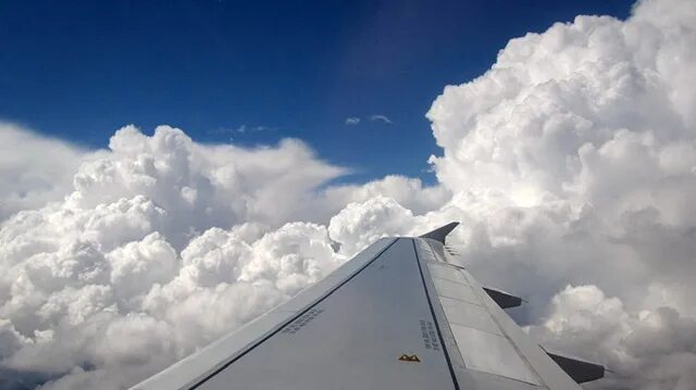 SKY HIGH The magical view of the sun rays breaking though the clouds from the pl