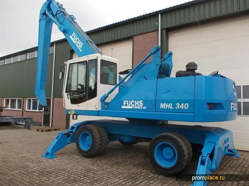 Перегружатели fuchs. Fuchs mhl 340. погрузчики fuchs mhl 360. металлоперегружатель fuchs 340. фукс 340 габариты.