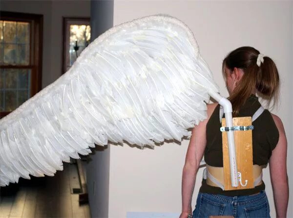 Крылья своими руками видео. Крылья изолон. Крепление для крыльев ангела. Каркас для крыльев. Каркас для крыльев из подложки.