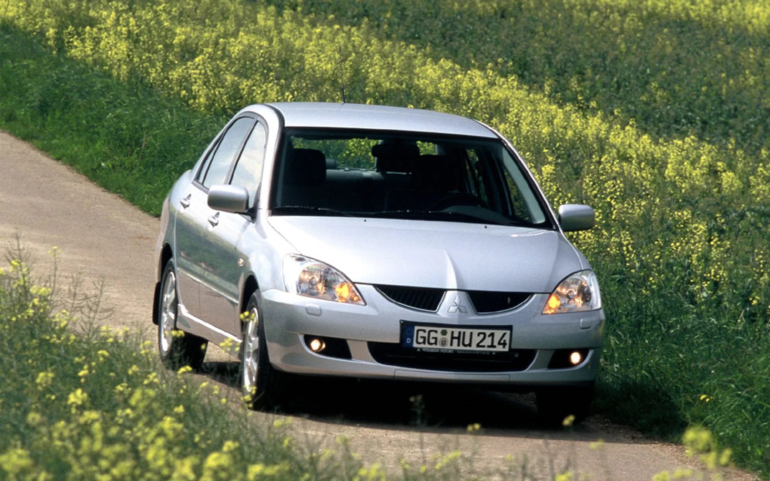 Мицубиси ланцер 9. Mitsubishi Lancer 9 поколения. Mitsubishi Lancer 1.6 2004. Митсубиси Лансер 9 2003.