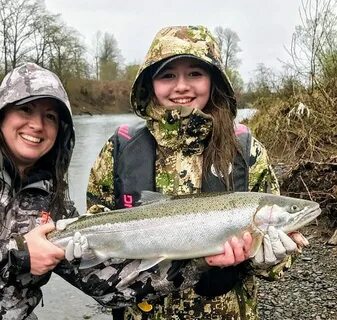 Young Girl Holding Fish FWS.gov 