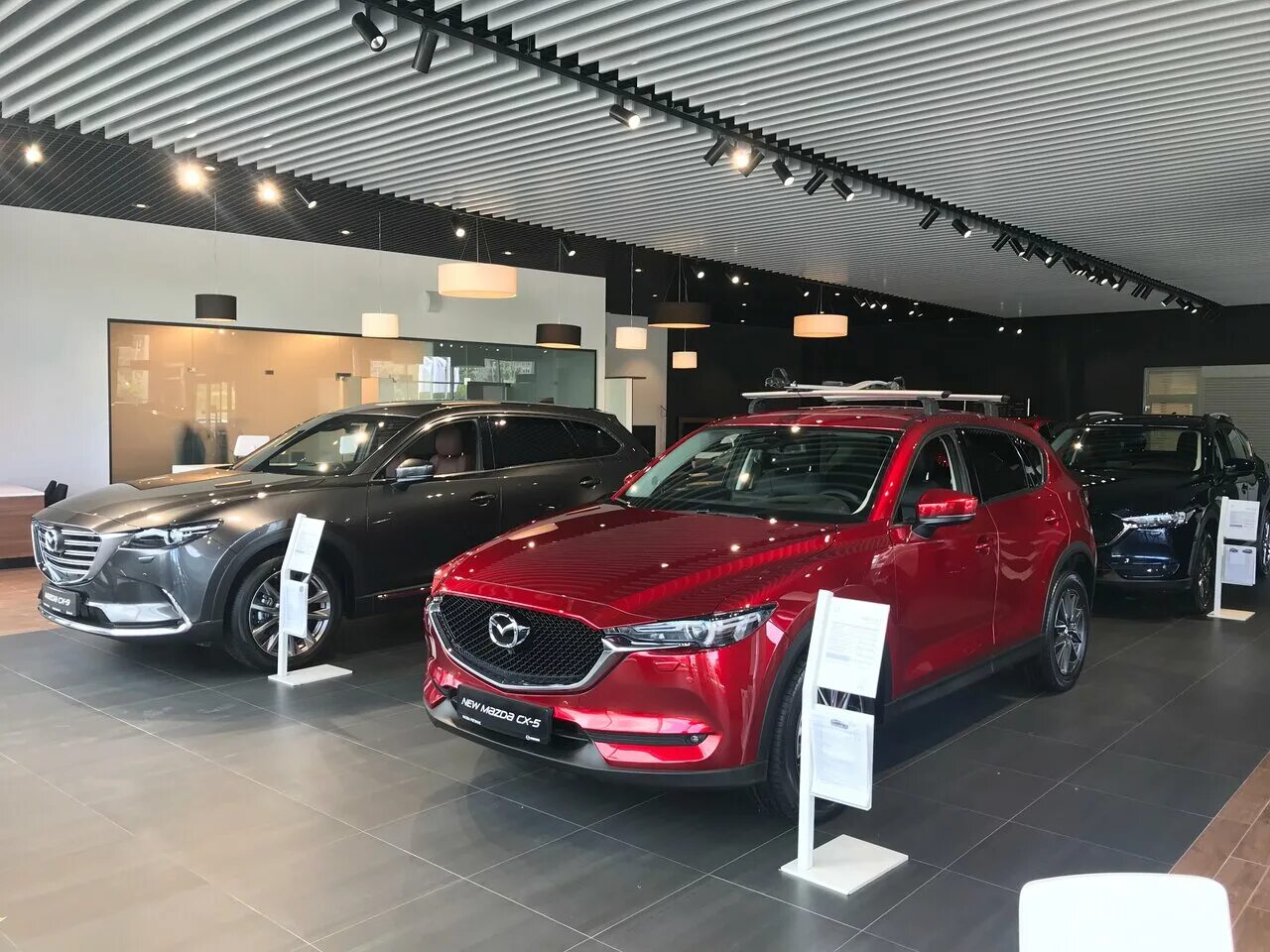 Mazda екатеринбург. Мазда Регинас. Мазда Регинас Екатеринбург. Автосалон Мазда Екатеринбург. Регинас автосалон ЕКБ.