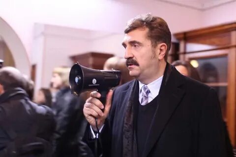 Комисаров