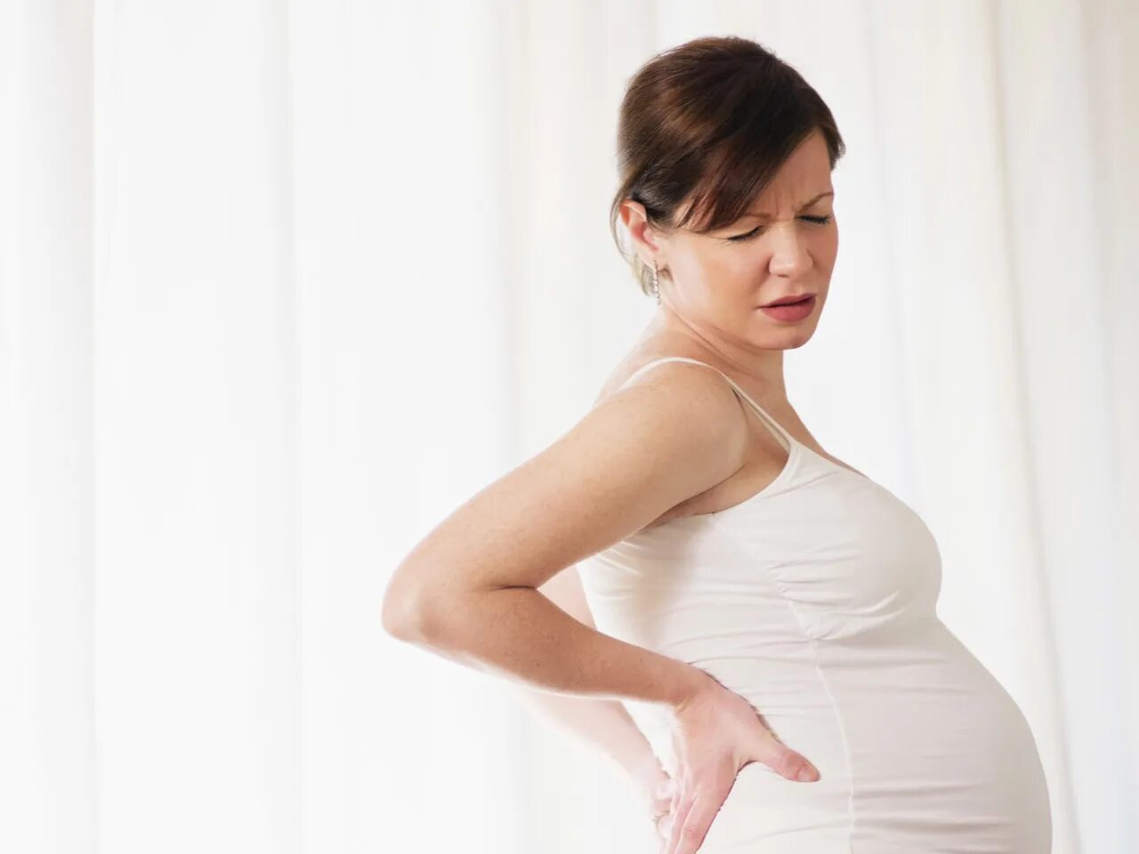 38 неделя беременности болит поясница. Простые беременные женщины. Спина у беременных. Боли у беременных женщин.
