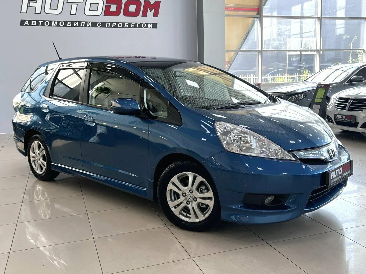 Фит шаттл 2011 год. Honda Fit Shuttle 2011. Хонда фит шаттл 2011. Хонда фит шаттл 2019. Хонда фит шаттл Рестайлинг.