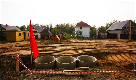 Какой землей поднять участок