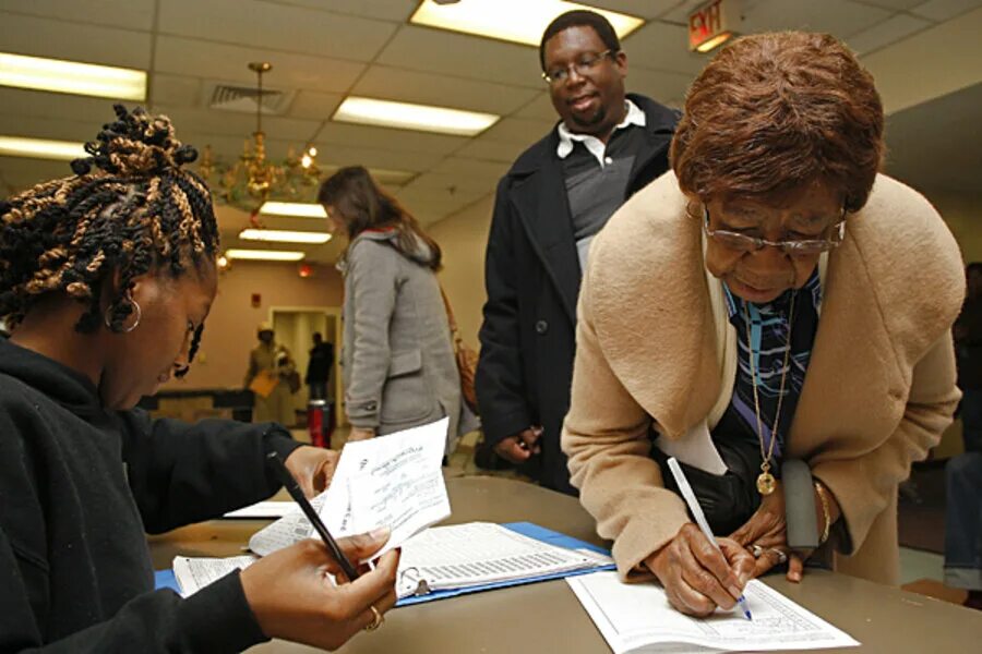 Election fraud. A voter casting a ballot in Africa.