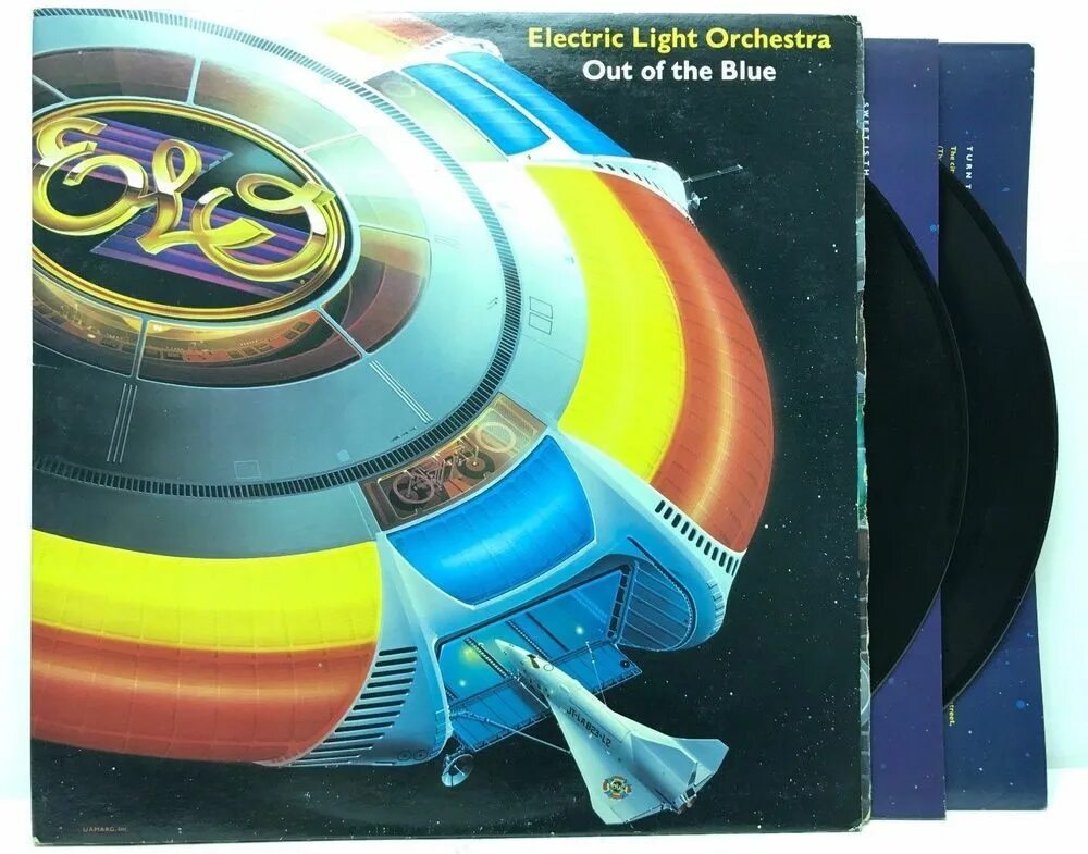 Blue light orchestra. Electric Light Orchestra 1977. Electric Light Orchestra out of the Blue 1977. Out of the Blue Electric Light Orchestra album. Elo out of the Blue 1977.