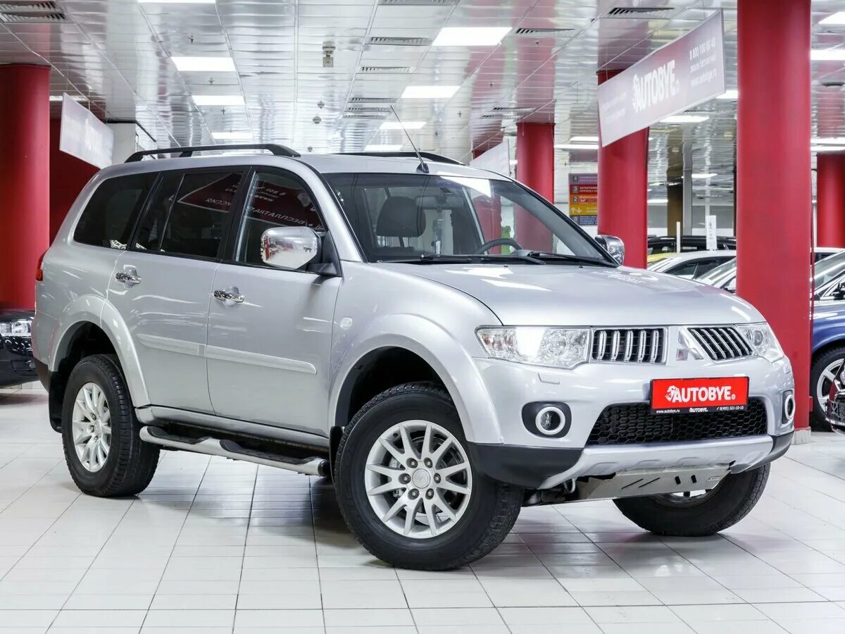 Mitsubishi pajero sport 5. Mitsubishi Pajero Sport 2011. Мицубиси Паджеро спорт 2.5 2011. Мицубиси Паджеро спорт дизель. Митсубиси Паджеро спорт 2011.