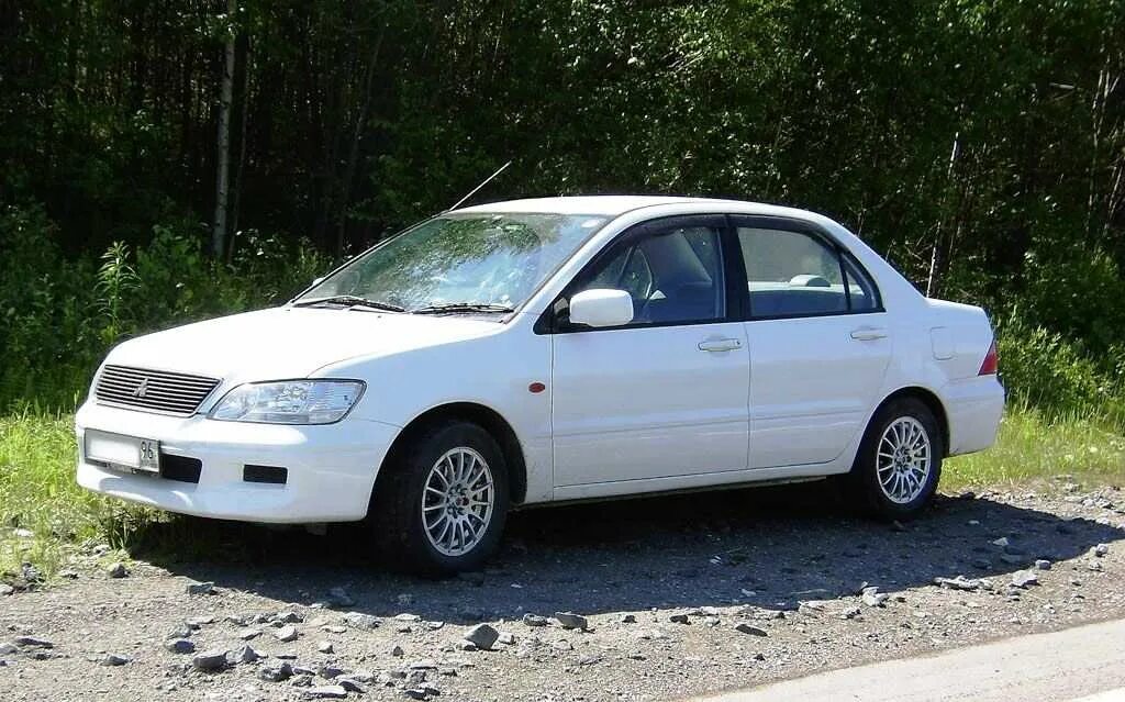 Mitsubishi lancer 2001. Mitsubishi Lancer Cedia 2001. Lancer Cedia 2001. Мицубиси Лансер Седиа 2001.