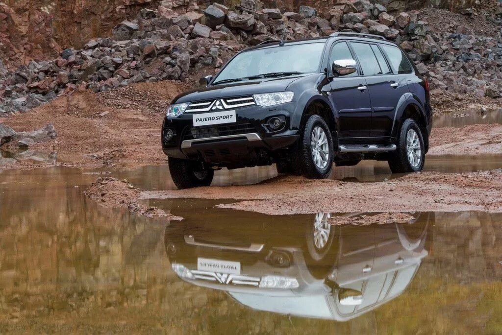 Мицубиси паджеро находится. Mitsubishi Pajero Sport. Митсубиси Паджеро спорт 2. Mitsubishi Pajero Sport (2g). Mitsubishi Pajero Sport 2013.