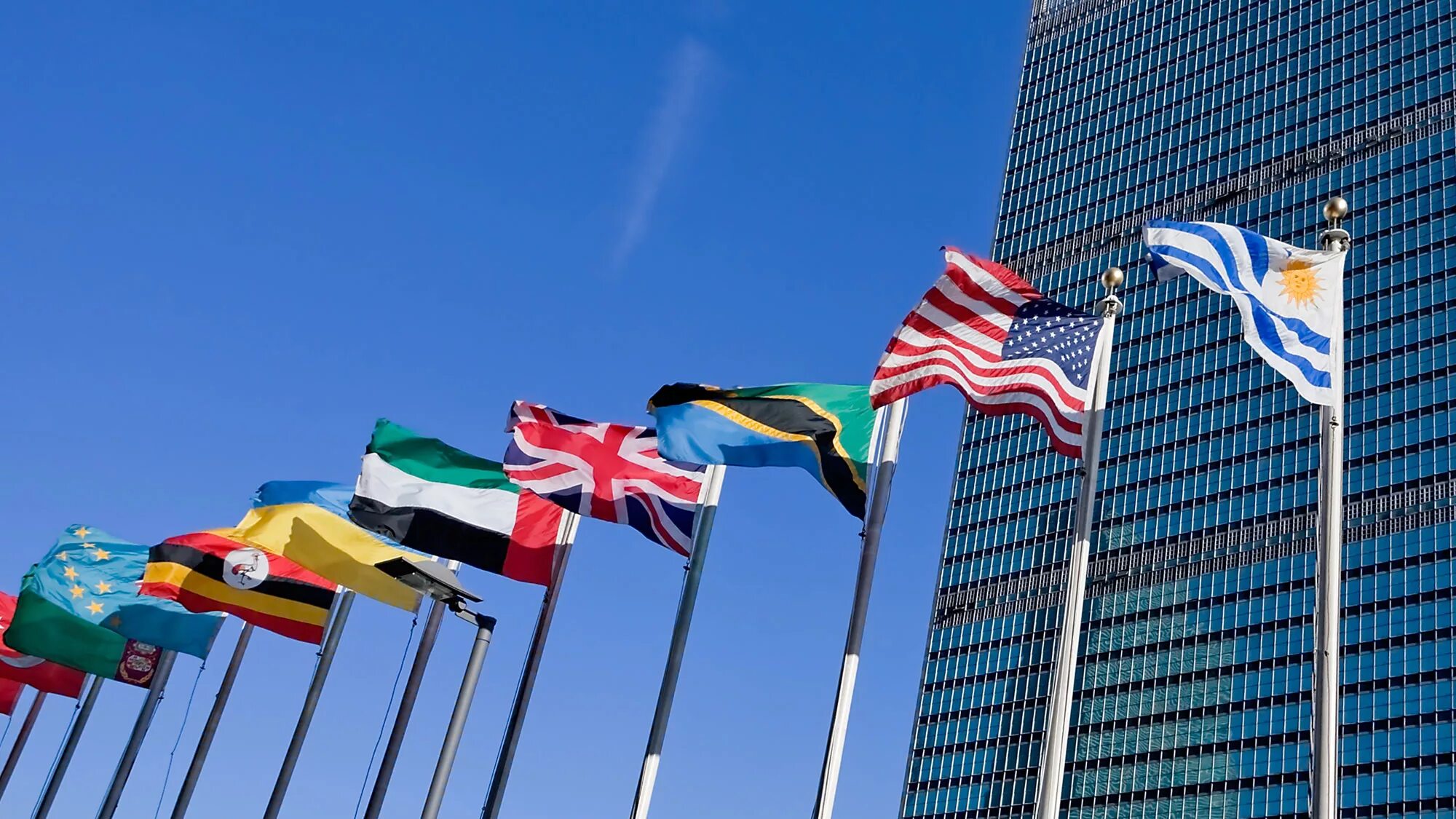 Штаб-квартира ООН В Нью-Йорке. Штаб-квартира ООН В Нью-Йорке фото. ООН Туркменистан флаги. Здание ООН В Нью-Йорке.