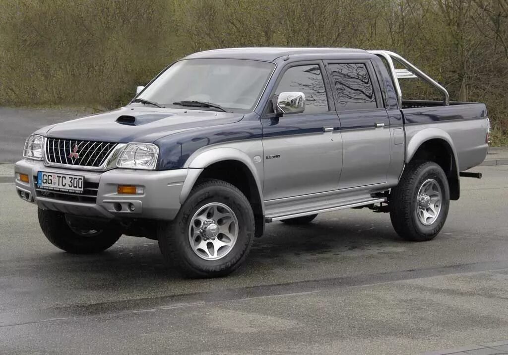 Митсубиси л200 2003. Мицубиси л200 3 поколение. Митсубиси l200 1990. Mitsubishi l200 пикап.