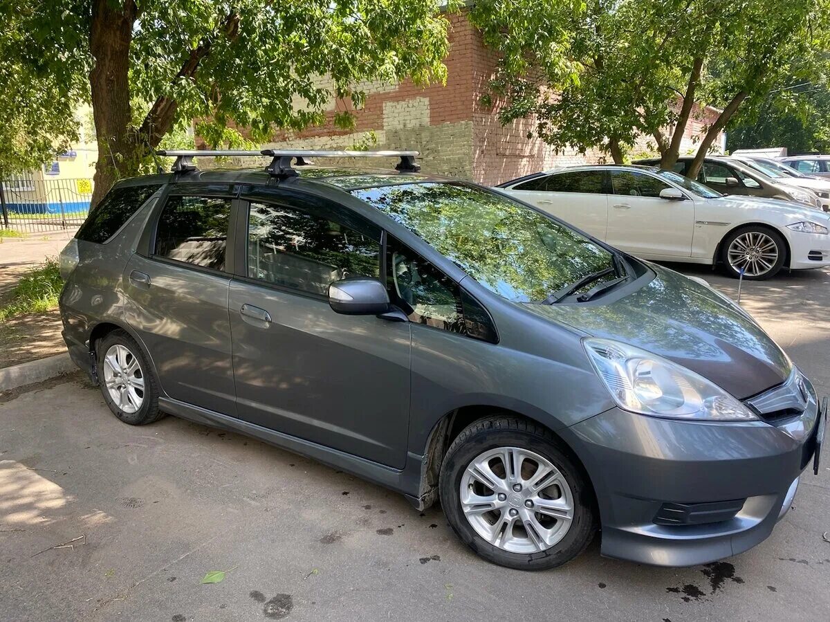 Хонда фит шаттл гибрид 2011. Honda fit shuttle 2011. Хонда фит шаттл 2011. Хонда фит шаттл 2012 белый. Honda fit shuttle 2011.