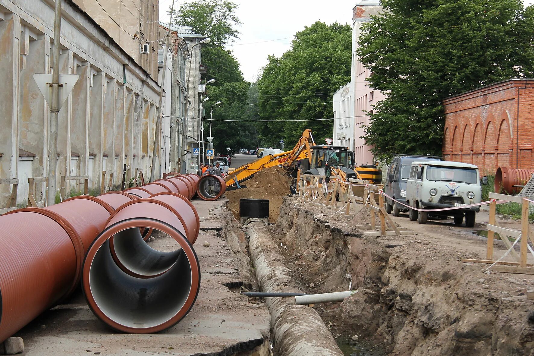 Водоотведение санкт петербург. Самотечная ливневая канализация. Трубы городской канализации. Коллектор ливневой канализации. Наружные канализационные сети.