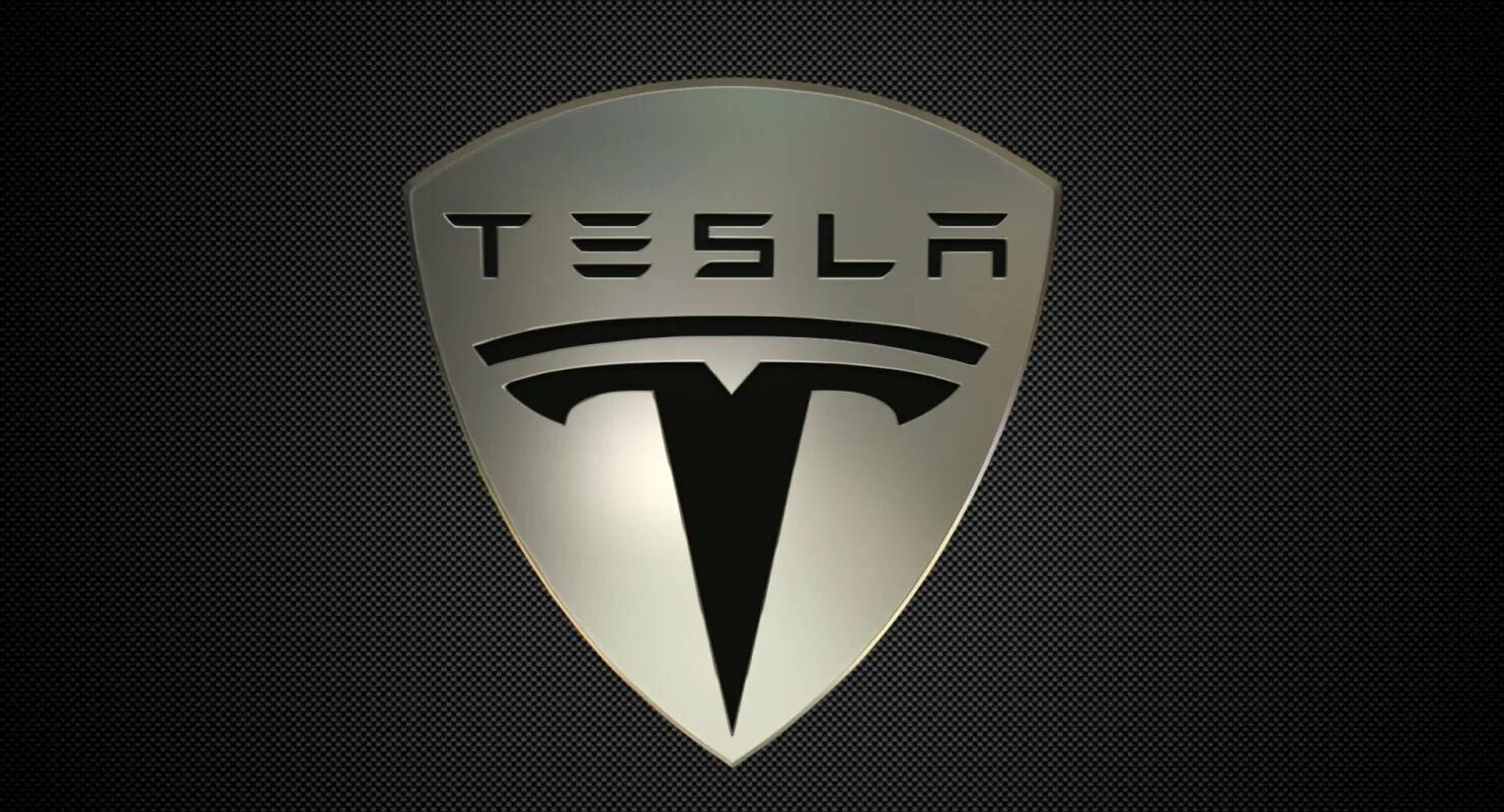 Знак теслы на машине. Тесла лого. Tesla Motors логотип. Тесла знак. Тесла знак компании.