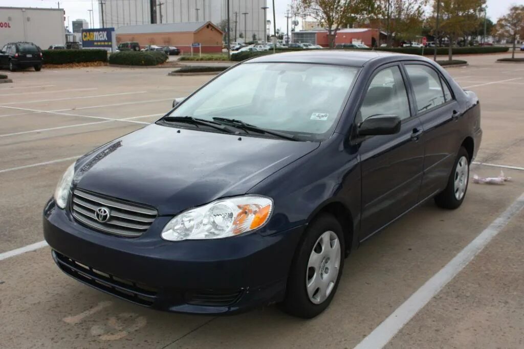 Toyota Corolla 2003. Тойота Королла 2003. Тойта Карола 2003. Тойота Королла американка 2003.