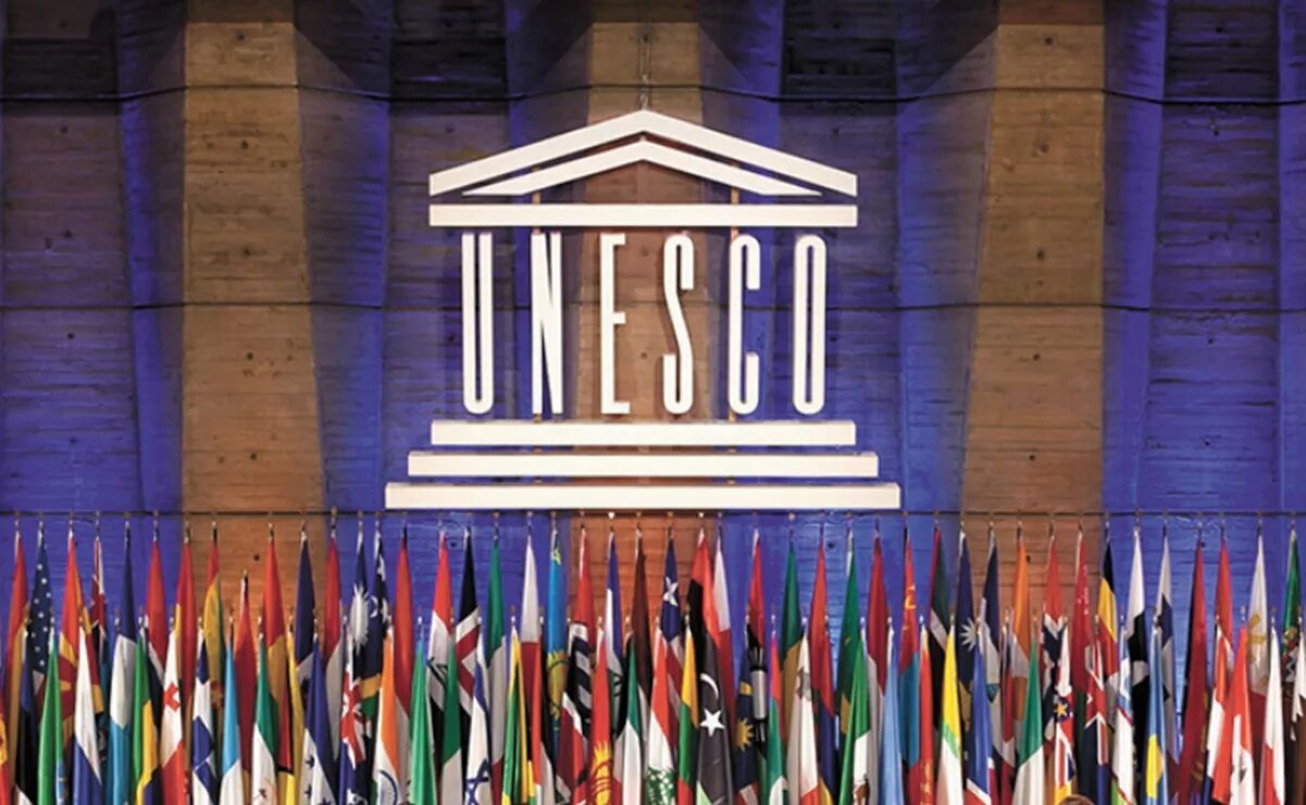 Организация Объединенных наций ЮНЕСКО. ООН по вопросам образования науки и культуры ЮНЕСКО. Штаб квартира ЮНЕСКО. Флаг ЮНЕСКО.