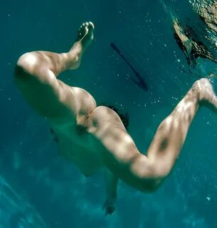 Diving nude.