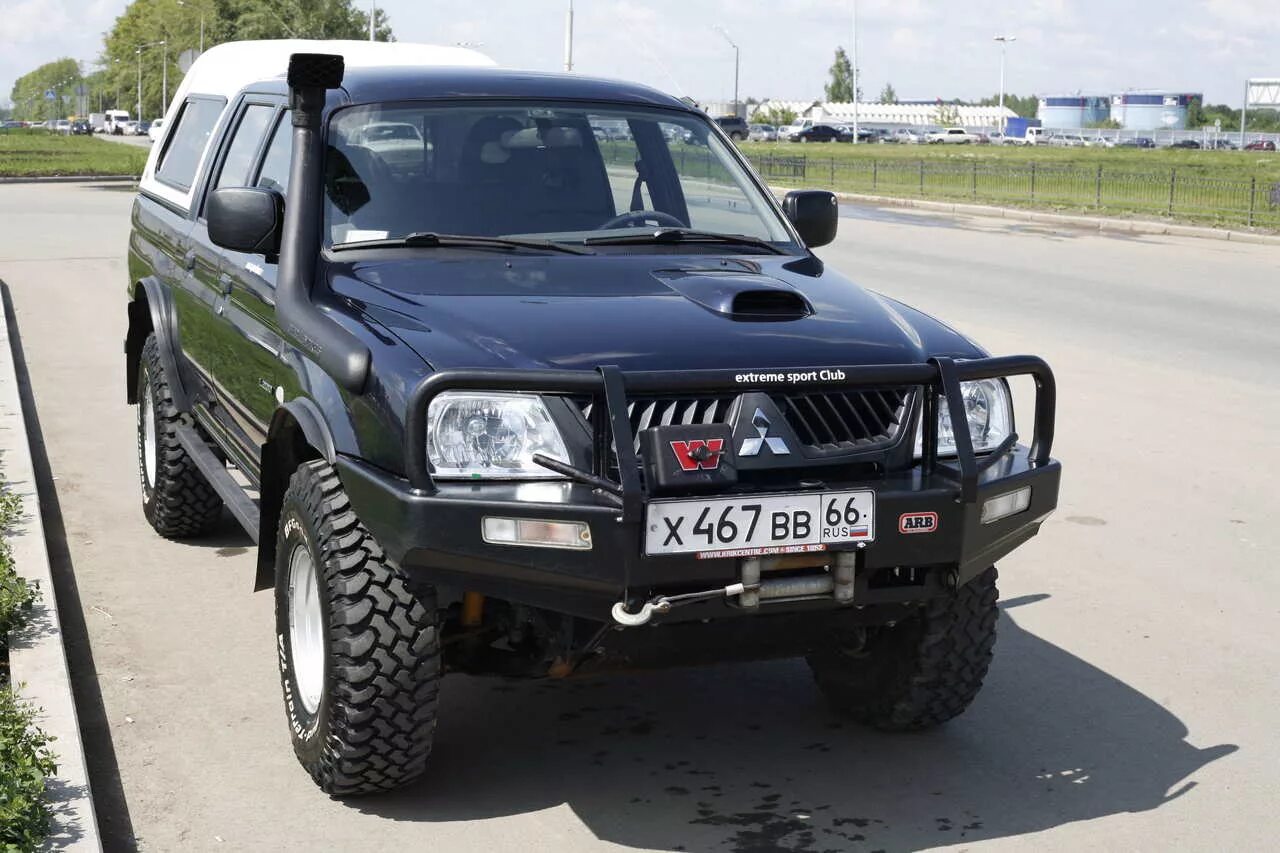 Mitsubishi l200 2005. Мицубиси л200 2004 года. Мицубиси л200 2005. Митсубиси л200 2005. Мицубиси л200 2005 года.