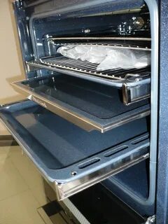 Установить направляющие в духовой шкаф