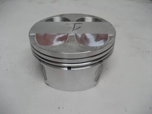 подвижный поршень. комплектование цилиндро поршневой группы. поршень мп34800. поршневая 4п15. скользящий поршень.