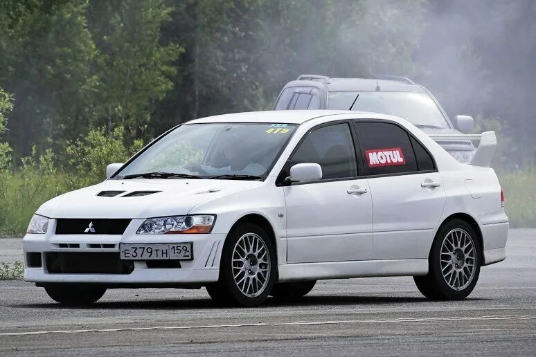 Mitsubishi st. Mitsubishi Evolution 13. Субару Эволюшен 7. Митсубиси Еволутион 7.