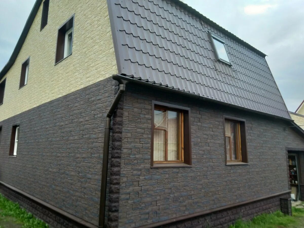 Дом из сайдинга под кирпич