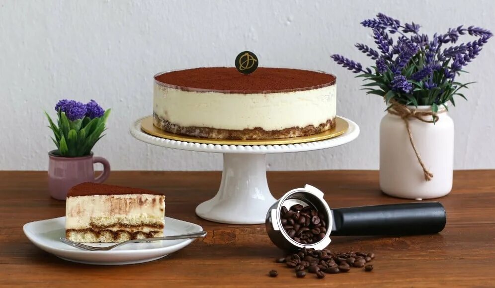 Tiramisu cake we are the night. Торт невысокий. торт широкий но невысокий. невысокий торт и длинные свечи. indonesian cake.