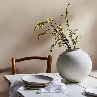 The vase is on the table