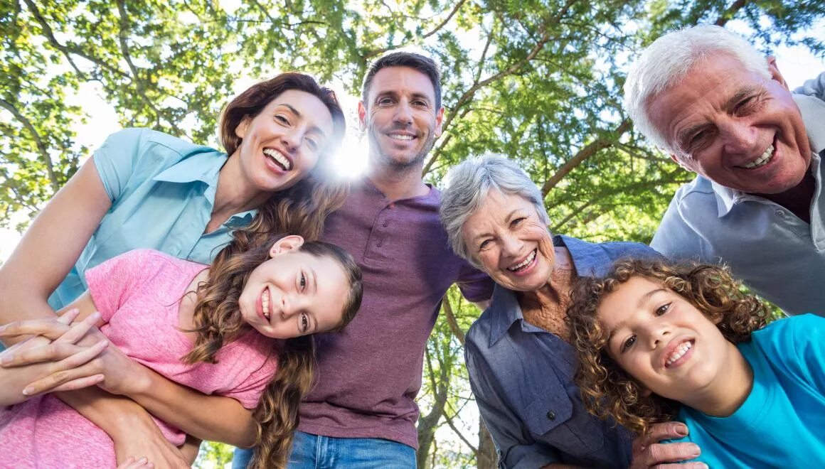 Like a big family. Семья улыбается. Большая семья улыбается. Большая счастливая семья. Разные поколения.