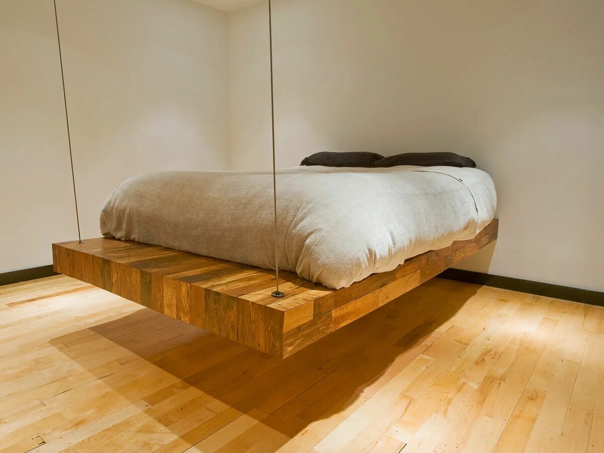 Левитирующая кровать лофт. Кровать Magnetic Floating Bed. Необычные кровати из дерева. Подвесная кровать парящая. Нестандартные кровати