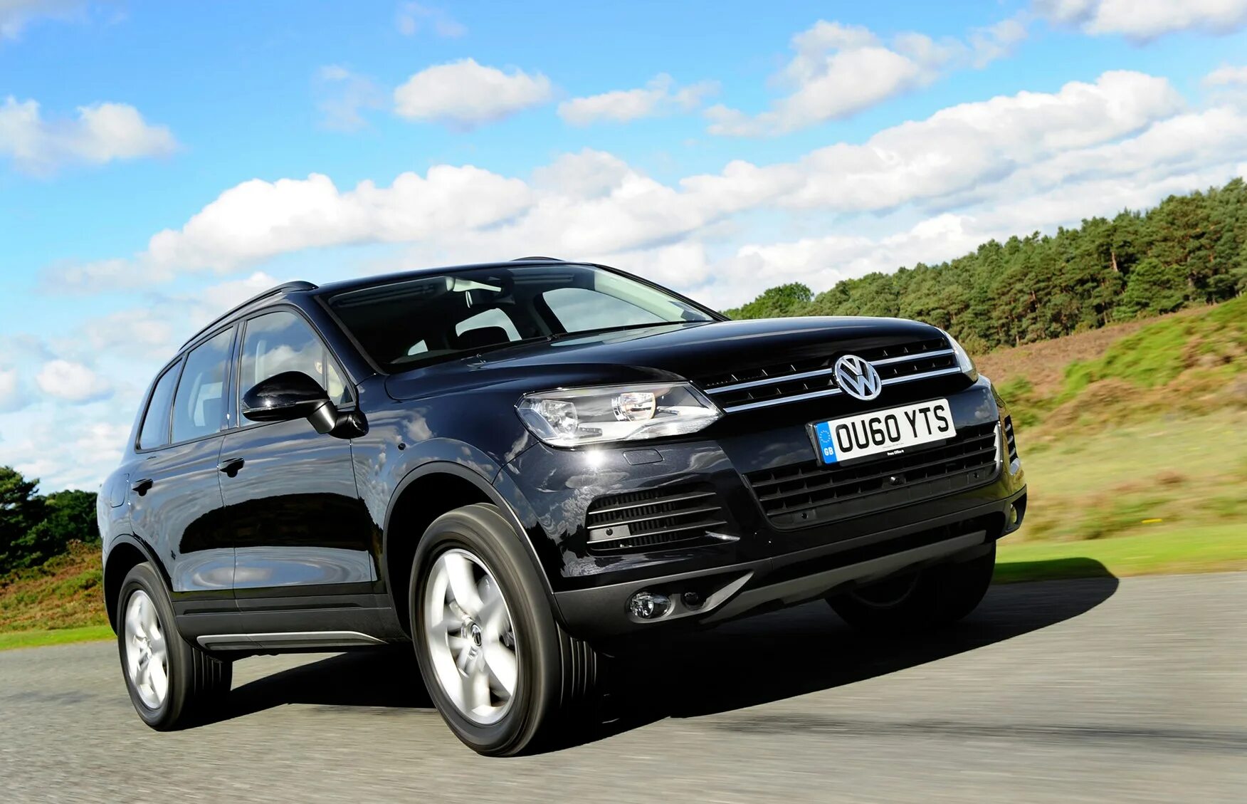 Туарег сколько литров. VW Touareg 2010. Volkswagen Touareg 2014 черный. VW Touareg 2014. Фольксваген Туарег 2 поколения.