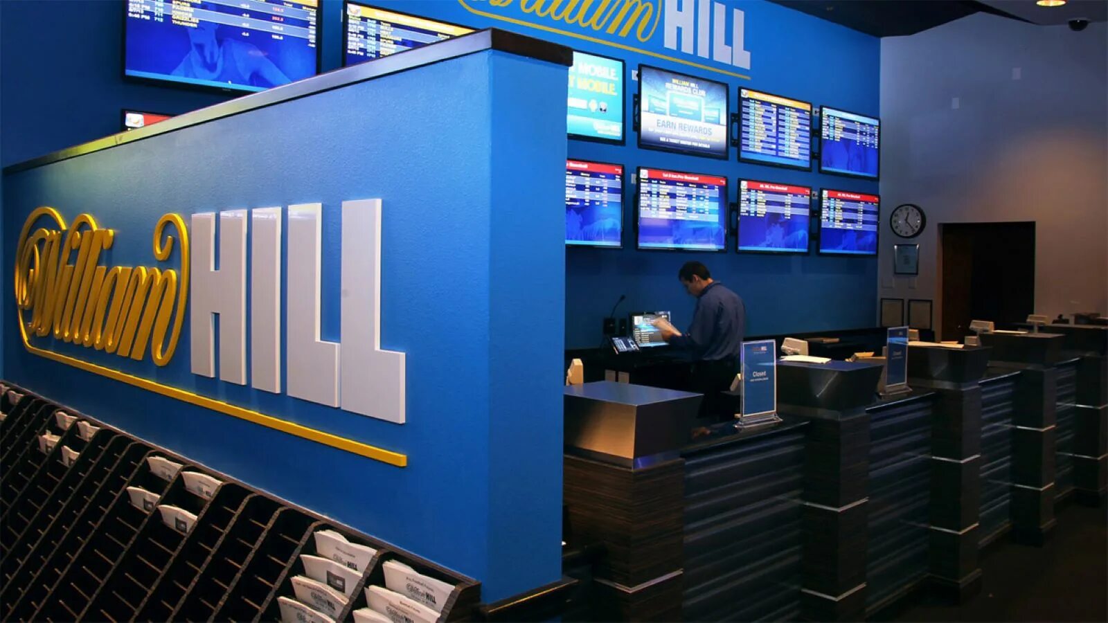 Will hill. Вильям Хилл. Вильям Хилл букмекерская контора. William Hill PLC. William Hill logo.