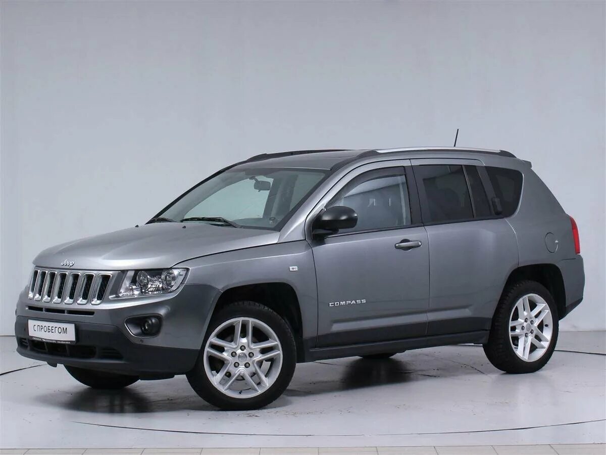 Джип компас 1. Jeep Compass 2012. Jeep Compass i 2012. Джип компас 170 л с объем двигателя. Серый внедорожник.