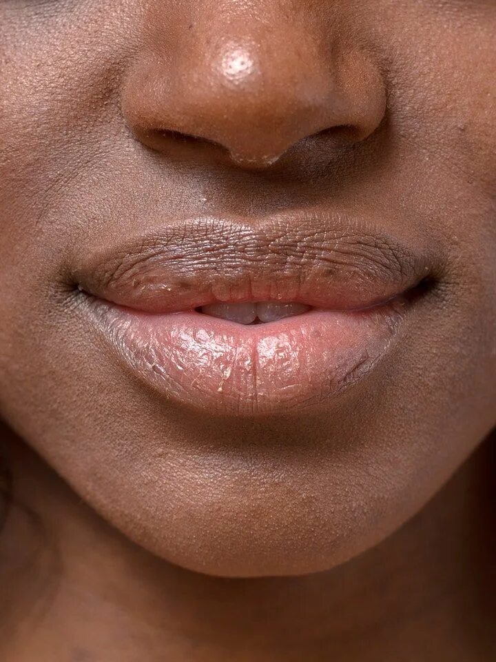 Close lips. Brown Lips. Dark Lips.