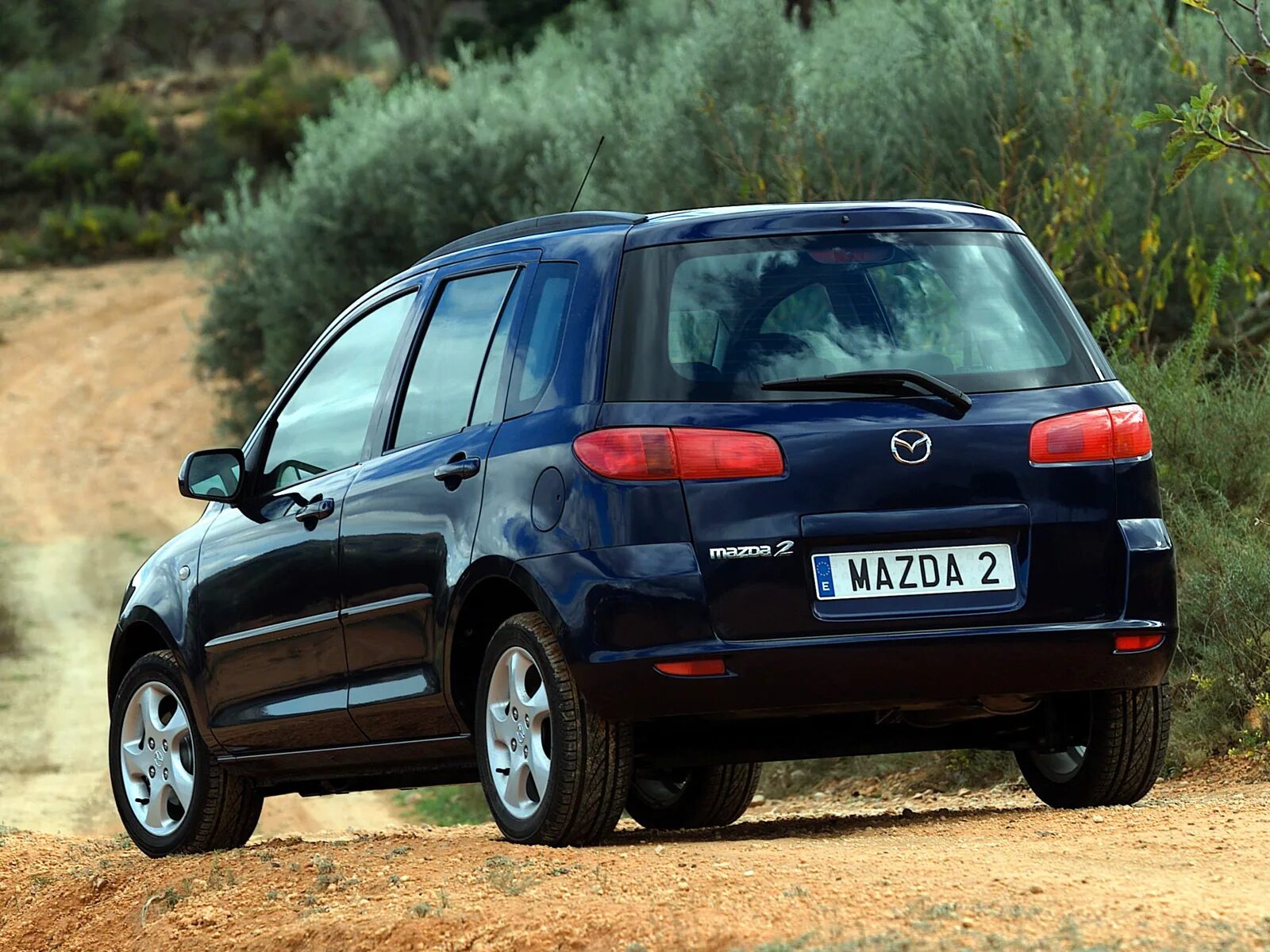 Mazda dy. Mazda 2 2003. Мазда 2 2005. Мазда 2 Демио 2003. Мазда 2 2002 года.