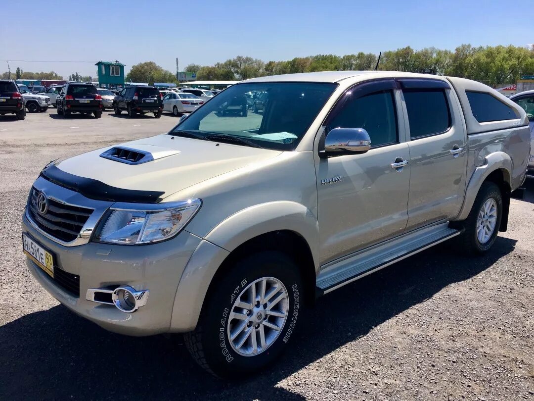 Хайлюкс 7 поколения. Toyota Hilux 7. Тойота Хайлюкс 2012. Тойота Хайлюкс 7 поколения. Тойота Хайлюкс пикап 2012.