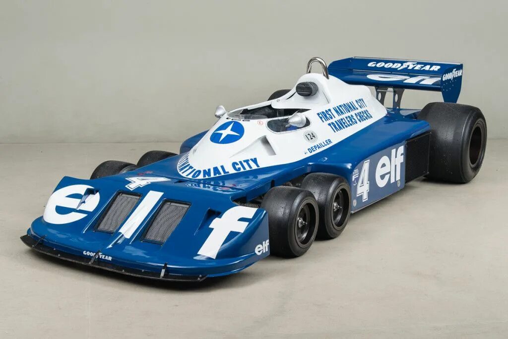 P34 18. Tyrrell p34. шестиколесный тирелл формула 1. 6 колёсный болид ф1. tyrrell p34 1976.