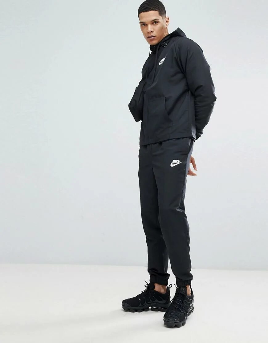 Черный спортивный костюм Nike Woven 886511-010. Костюм Nike NSW Woven men's track Suit черный. Спортивный костюм Nike Tracksuit. Спортивный костюм найк черный мужской Nike.