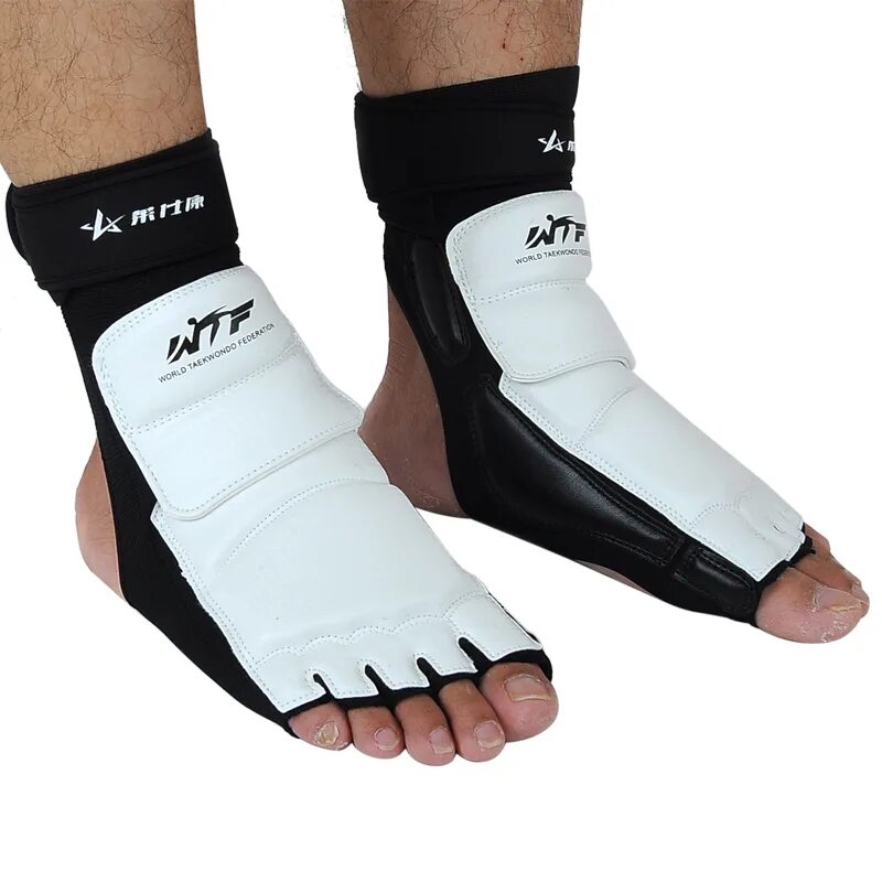 Защита стопы. Защита голени в тэквандо ВТФ. Защита для ног WTF ZTT-019-T, щитки на ноги, защита голени. Защита стопы для тхэквондо ВТФ. Защита ступни тхэквондо футы.
