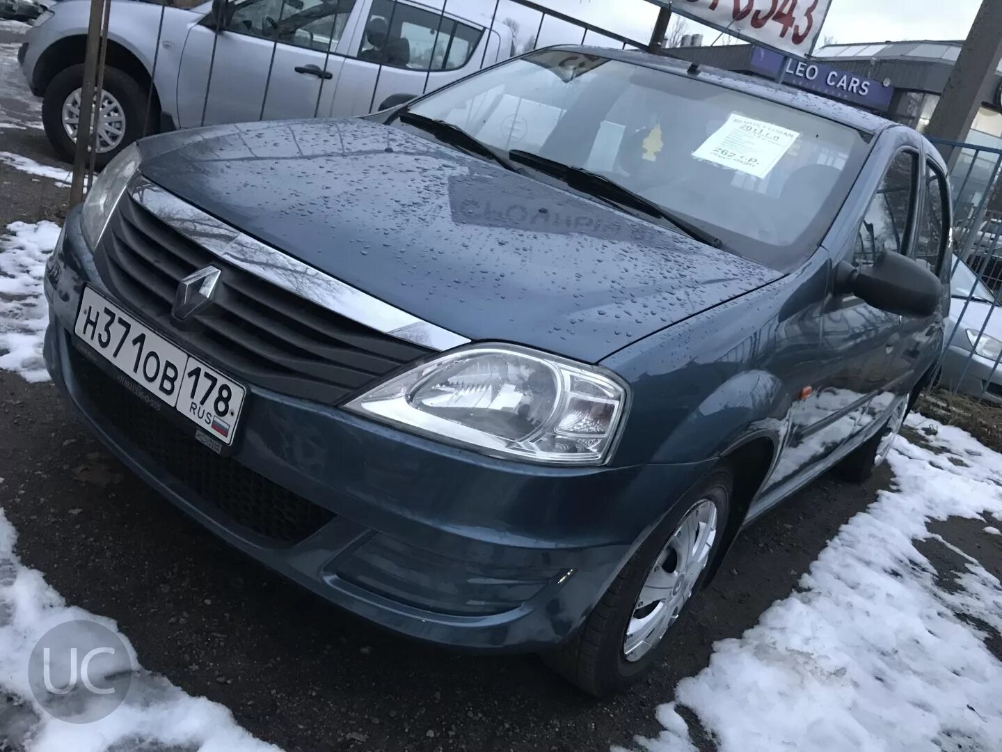 Рено Логан 2010. Renault Logan 2010. Рено Логан мокрый асфальт. Торги Рено Логан.