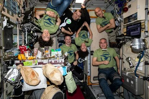ISS Expedition 61 crew in the Zvezda service module for a New Year's E...