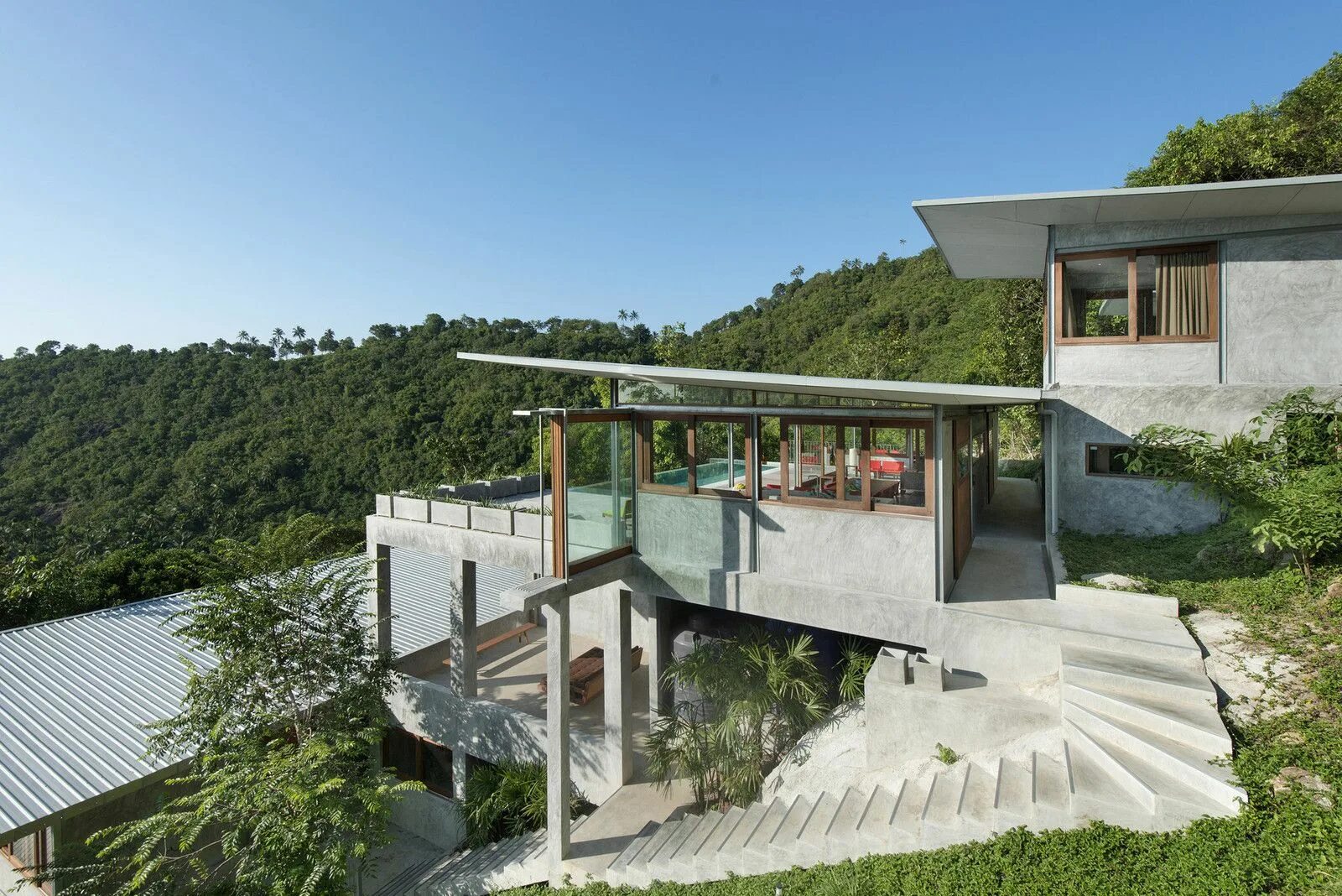 Pin on House House built into hillside, Houses on slopes, Hillside house
