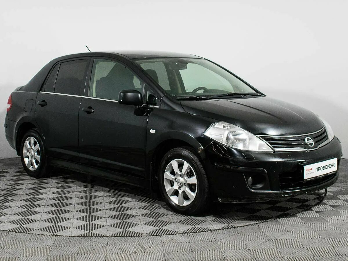 Ниссан тиида 2010 хэтчбек. Ниссан Тиида 2010 хэтчбек чёрная. Nissan Tiida 2010 седан. Ниссан Тиида 2010 черная. Ниссан Тиида 2008 год хэтчбек.